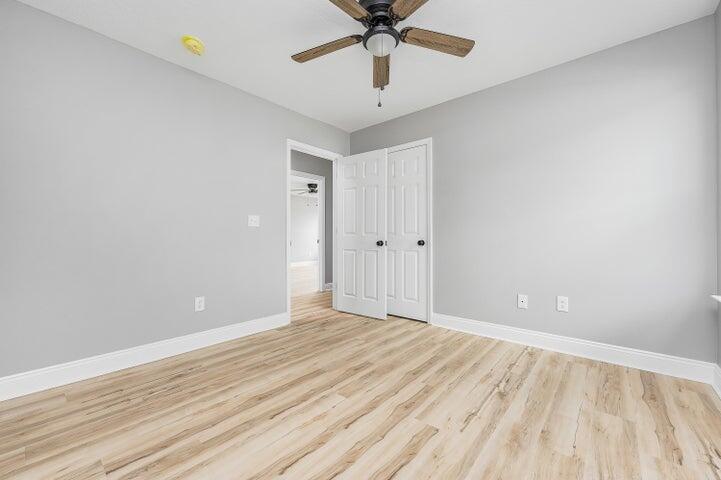 5428 Bayleaf Drive Crestview, FL 32539 - Photo 20 of 23 wooden floor in an empty room