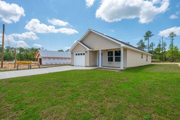 5428 Bayleaf Drive Crestview, FL 32539 - Photo 2 of 23 a view of a house with a backyard