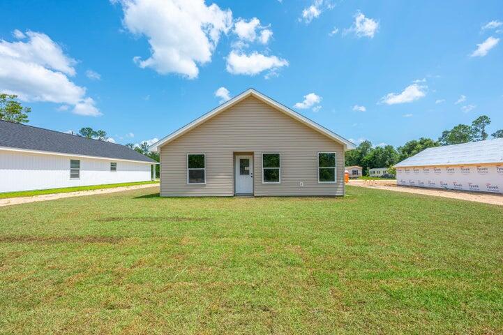 5428 Bayleaf Drive Crestview, FL 32539 - Photo 23 of 23 a view of a house with a backyard