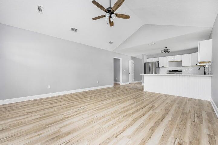 5428 Bayleaf Drive Crestview, FL 32539 - Photo 5 of 23 a view of a kitchen with a sink and cabinets
