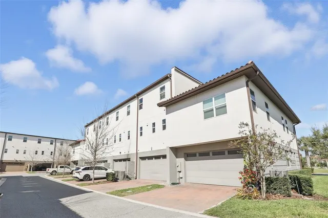 a view of a street with cars