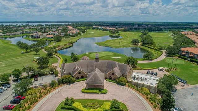 a view of a swimming pool with a yard
