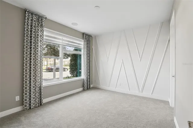 a view of room with front door