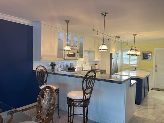 2758 Northeast 30th Avenue, Unit 3A Lighthouse Point, FL 33064 - Photo 11 of 29 Kitchen Countertop_dinning rm