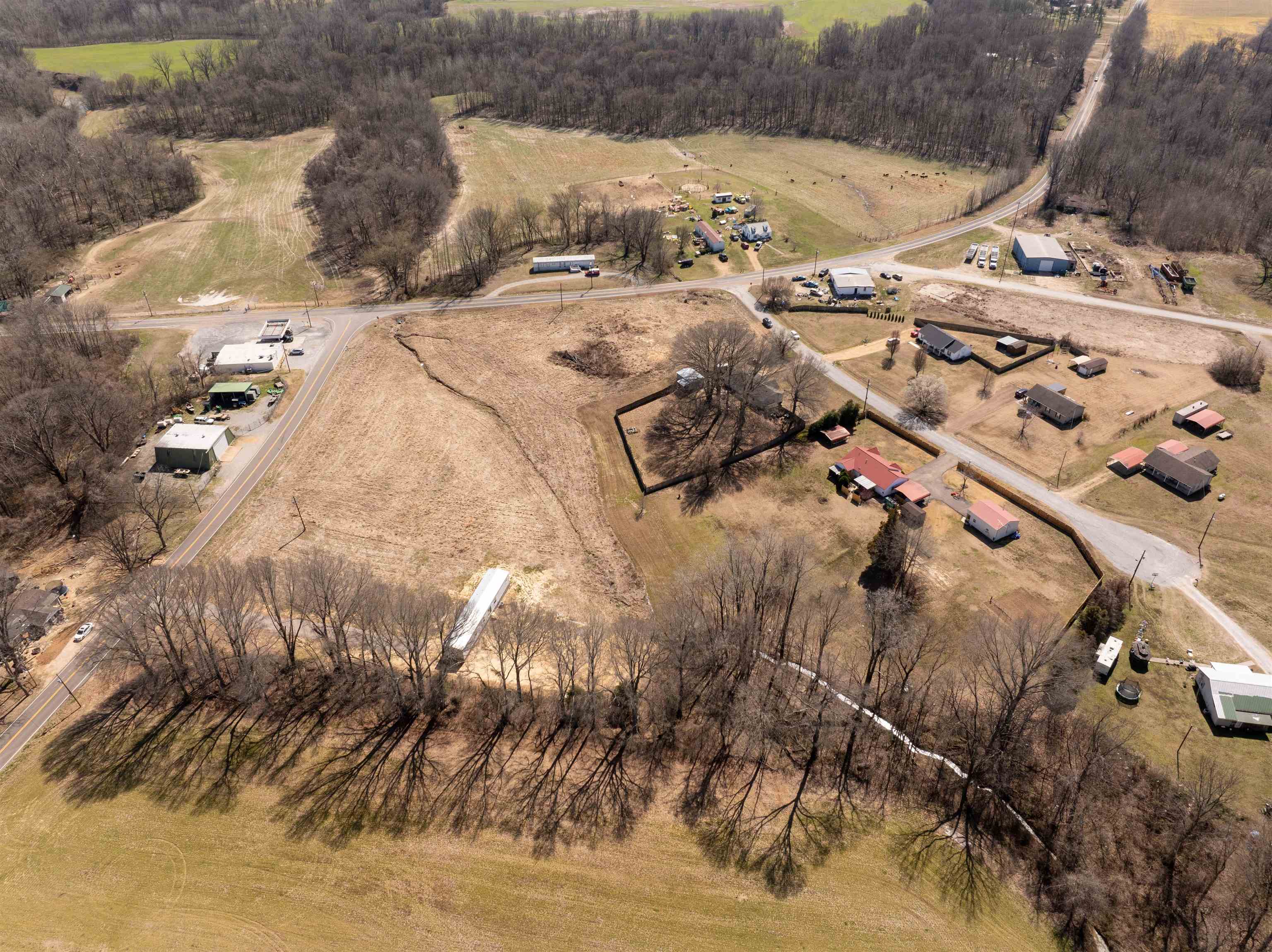 Birds eye view of property with a rural view