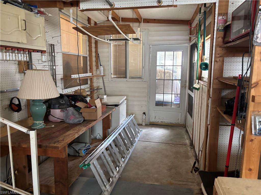 49 Turquoise Avenue, Unit 49T Naples, FL 34114 - Photo 21 of 29 a view of balcony and workspace