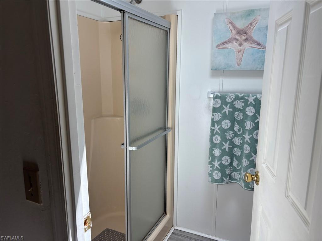 49 Turquoise Avenue, Unit 49T Naples, FL 34114 - Photo 25 of 29 a view of a hallway with closet and front door