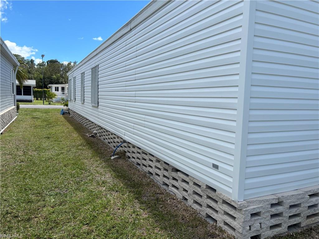 49 Turquoise Avenue, Unit 49T Naples, FL 34114 - Photo 3 of 29 a view of a backyard