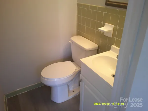 a bathroom with a toilet and a sink