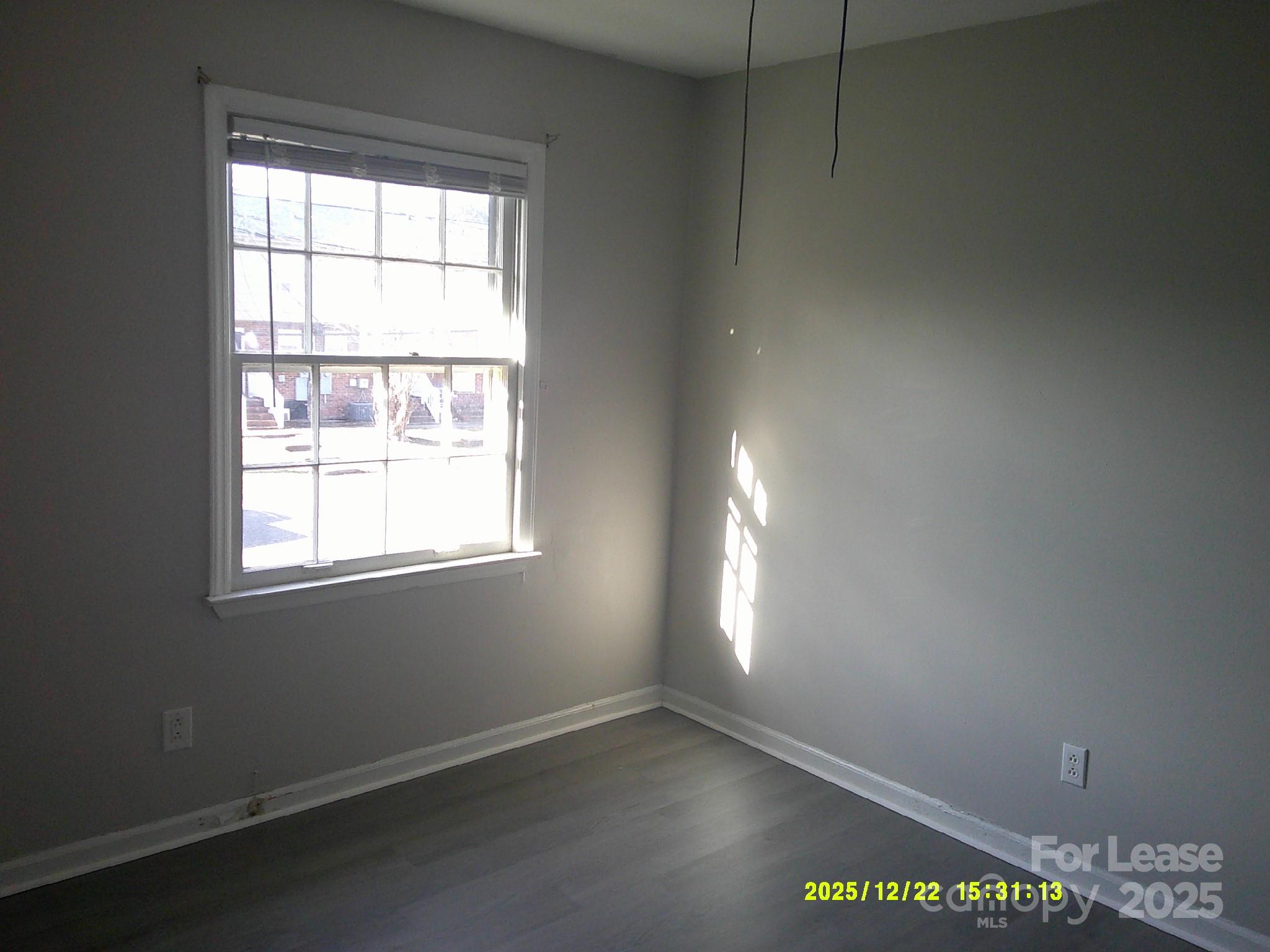 1205 County Home Road, Unit 3 Conover, NC 28613 - Photo 6 of 8 an empty room with a window