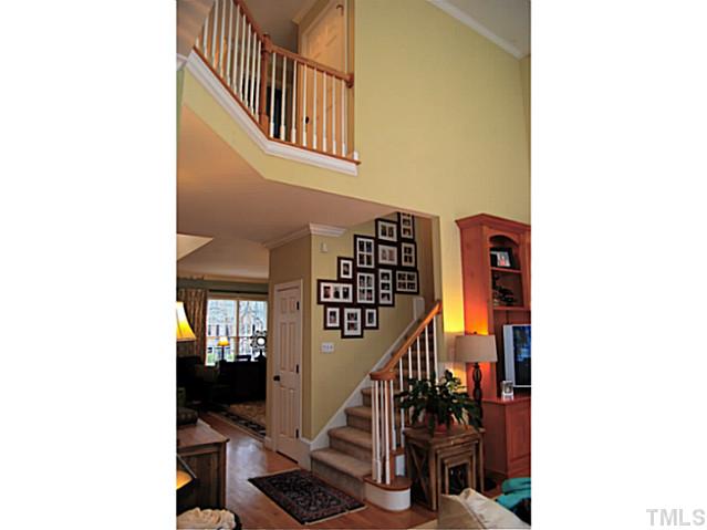 4019 Heathgate Lane Raleigh, NC 27613 - Photo 11 of 24 View of open family room and second level.