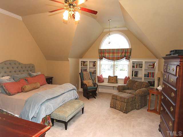 4019 Heathgate Lane Raleigh, NC 27613 - Photo 12 of 24 Built-in bookcases & window seat.