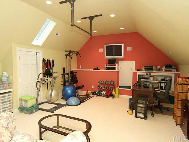 4019 Heathgate Lane Raleigh, NC 27613 - Photo 22 of 24 3rd flex room with office, workout gym & additional storage plus full bath.