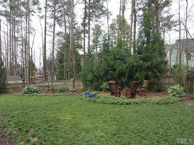 4019 Heathgate Lane Raleigh, NC 27613 - Photo 23 of 24 View of back yard with stone patio.