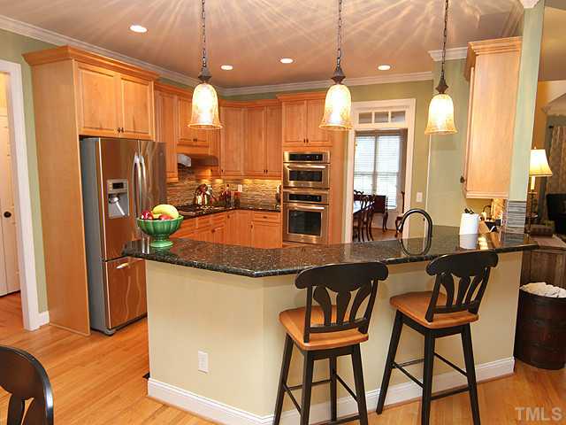4019 Heathgate Lane Raleigh, NC 27613 - Photo 5 of 24 Stainless appliances, gas range.