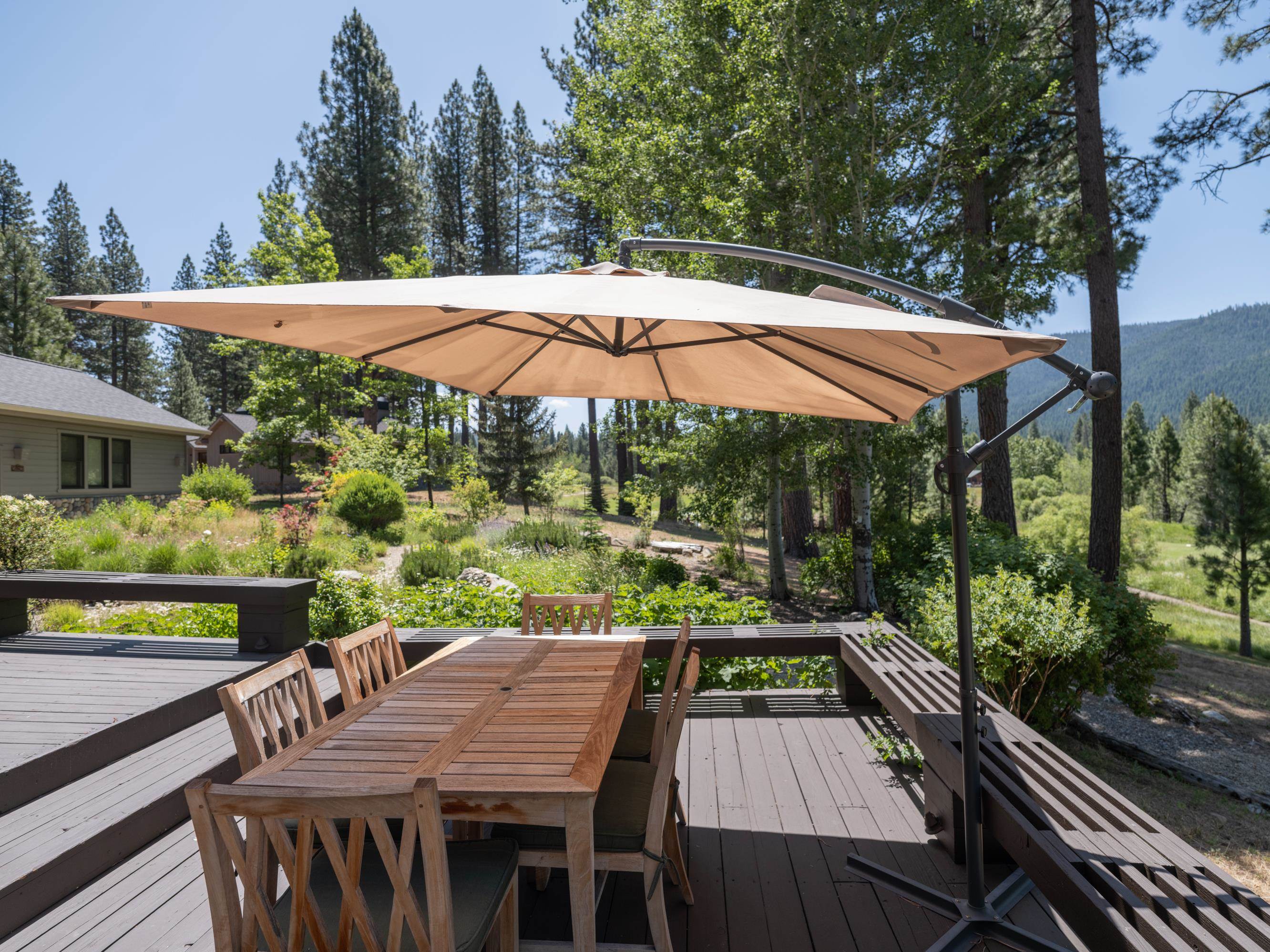 134 Quail View Circle Clio, CA 96106 - Photo 32 of 49 an outdoor space with furniture and umbrella