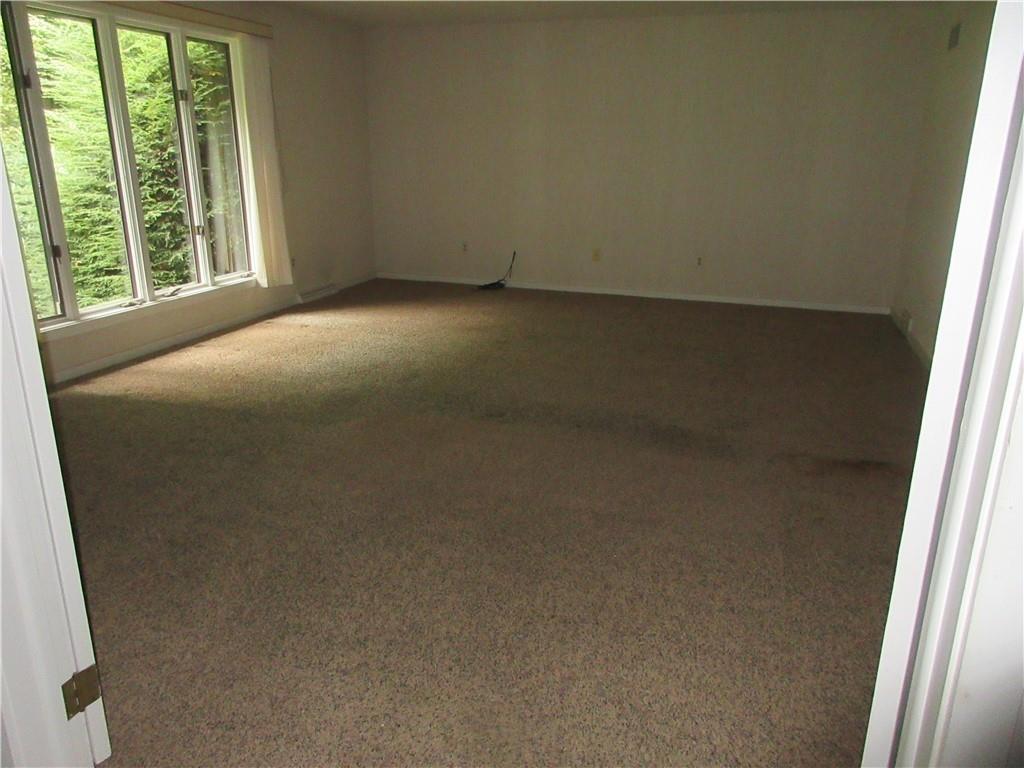 136 Hamel Road Renfrew, PA 16053 - Photo 6 of 18 an empty room with a window