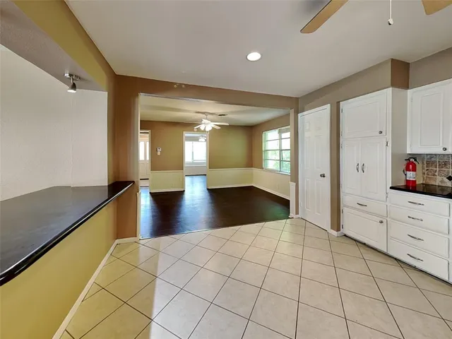 a view of house with yard