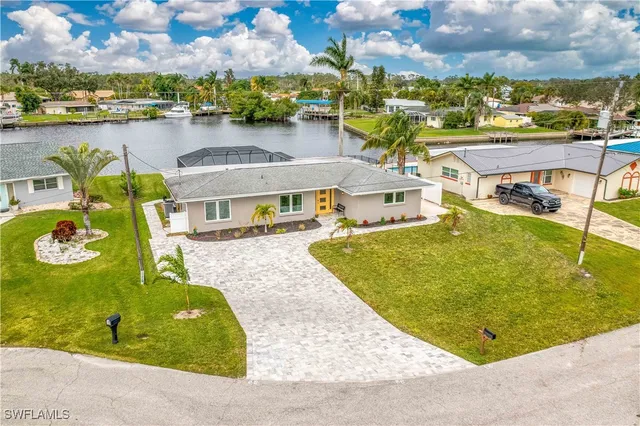 a view of a swimming pool with a lake view