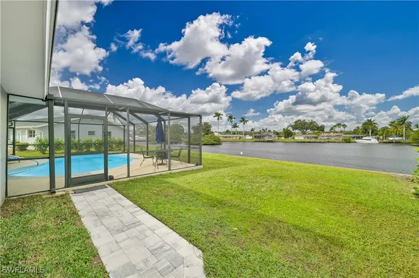 a view of a swimming pool with a lake view