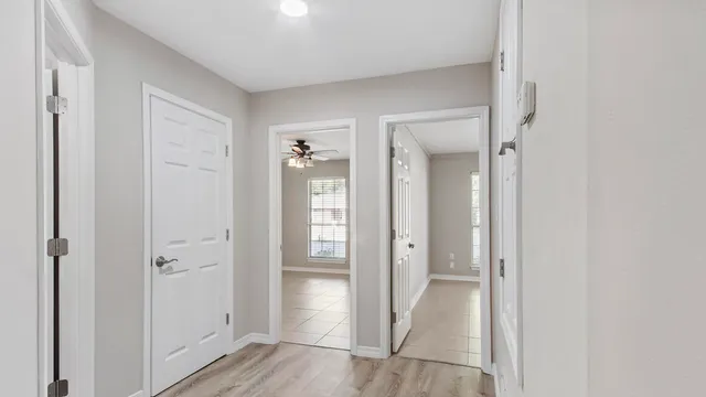 a view of a bathroom with a glass door