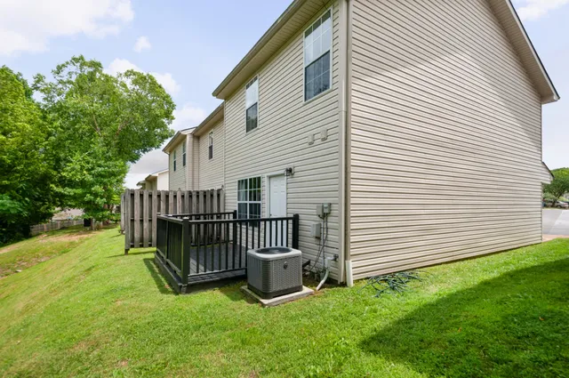a view of backyard with deck