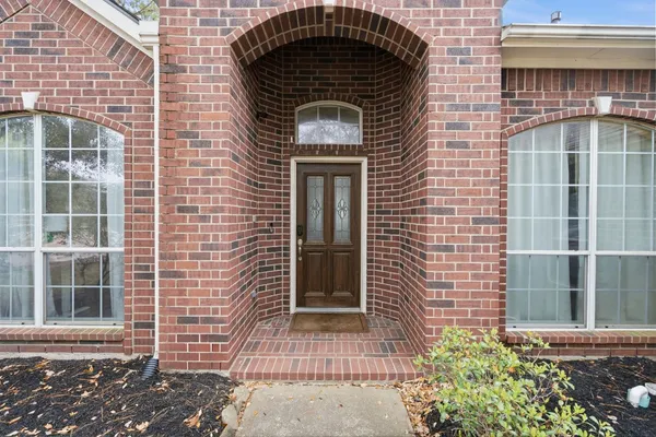 a front view of a house with a door
