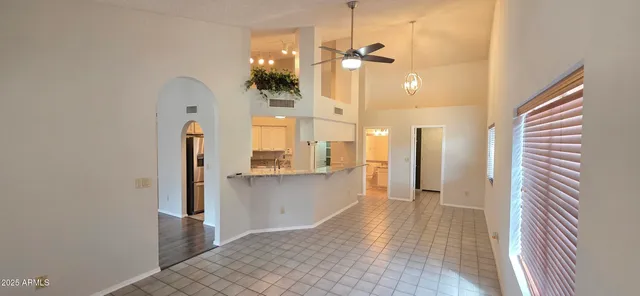 a view of a kitchen and a window
