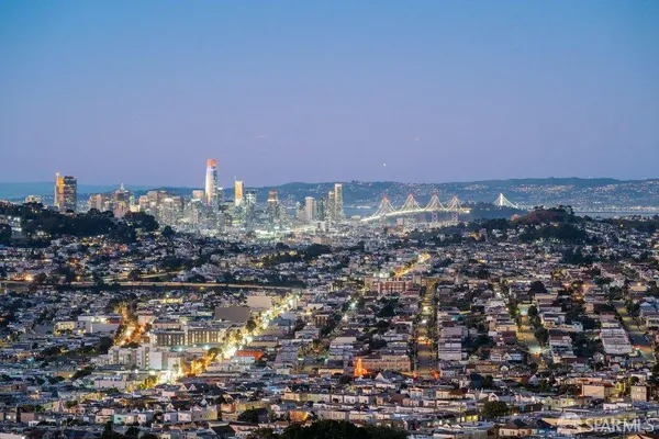 a view of a city with tall buildings