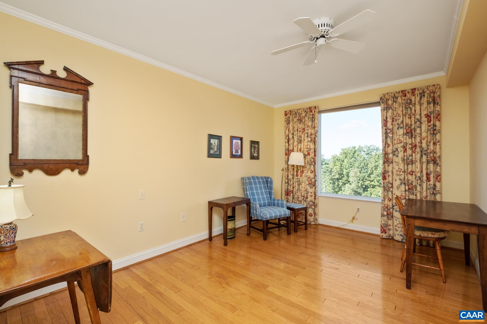 500 Crestwood Drive, Unit 1305 Charlottesville, VA 22903 - Photo 13 of 32 a view of a livingroom with furniture and a window