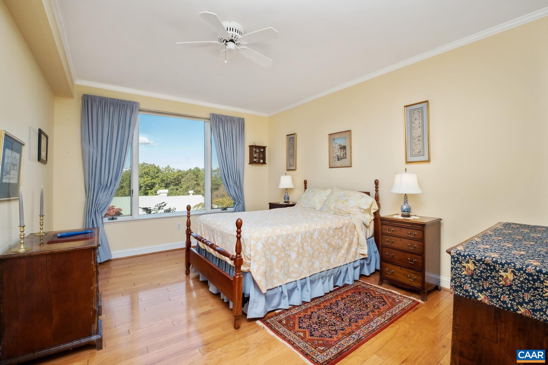 500 Crestwood Drive, Unit 1305 Charlottesville, VA 22903 - Photo 17 of 32 a bedroom with a bed and a window