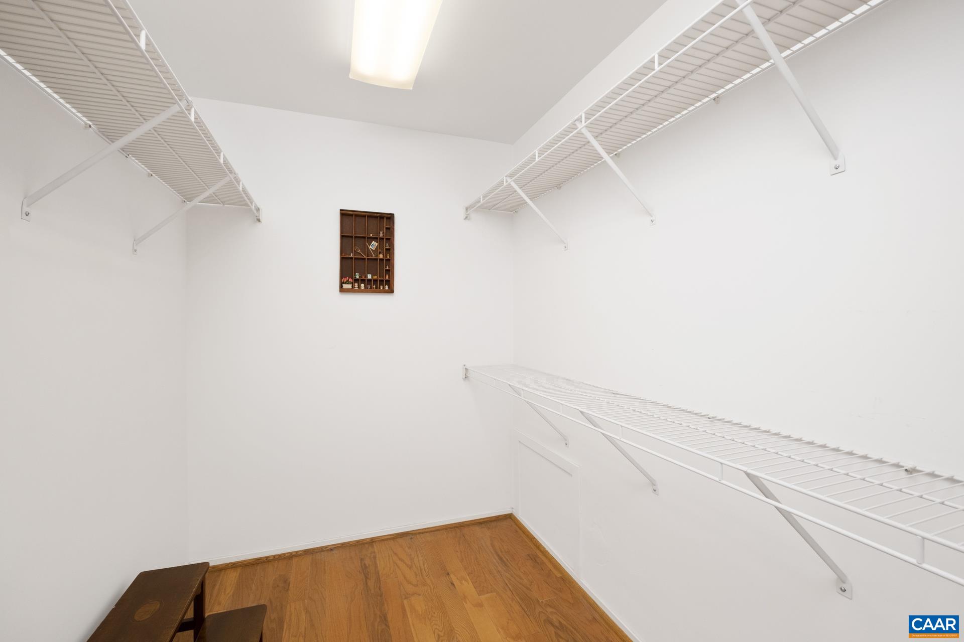 500 Crestwood Drive, Unit 1305 Charlottesville, VA 22903 - Photo 19 of 32 a view of small space with racks on the wall