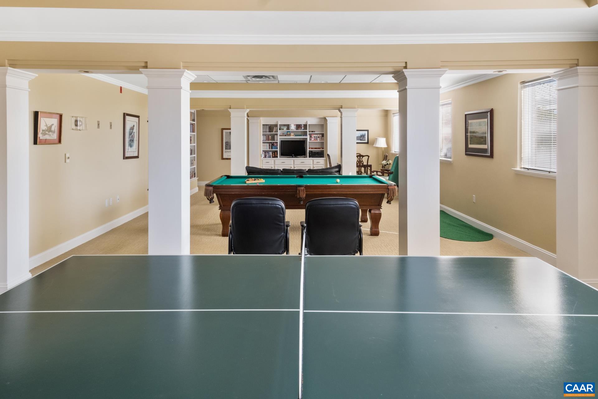 500 Crestwood Drive, Unit 1305 Charlottesville, VA 22903 - Photo 26 of 32 a view of a livingroom with furniture wooden floor and windows