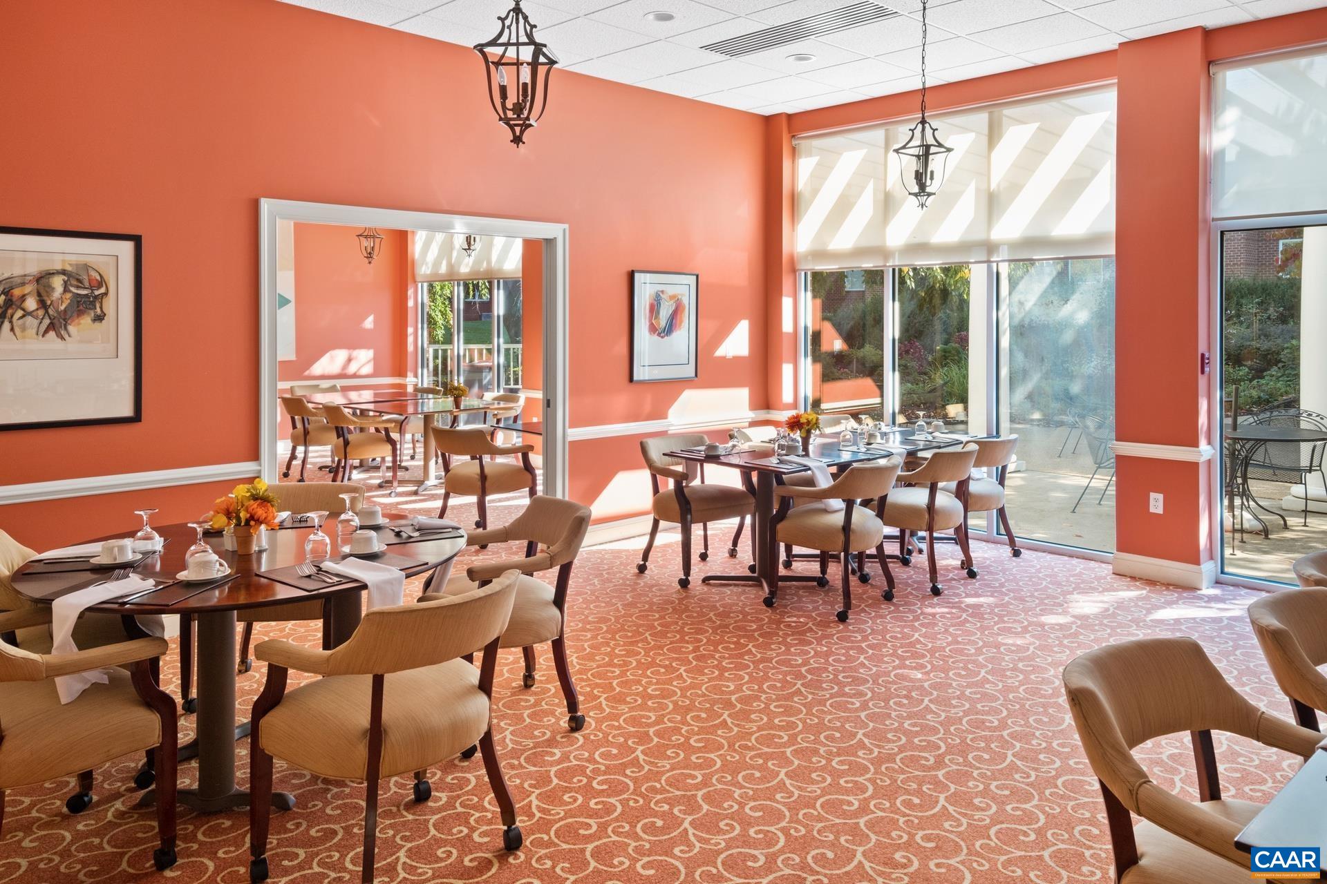500 Crestwood Drive, Unit 1305 Charlottesville, VA 22903 - Photo 29 of 32 a view of a dining room with furniture window and outside view