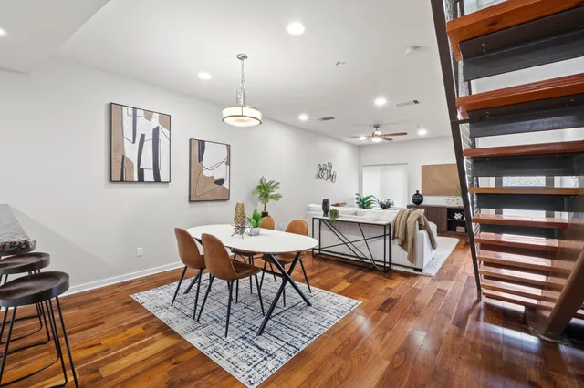 a view of a dining room with furniture