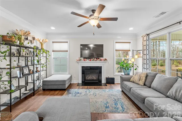 a view of a livingroom with workspace and a couch