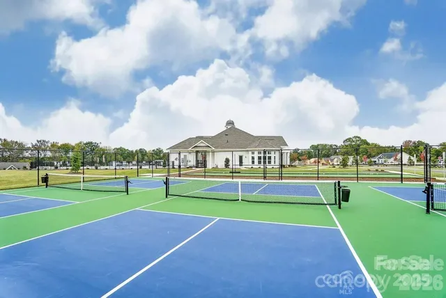 a view of a big yard in front of the house