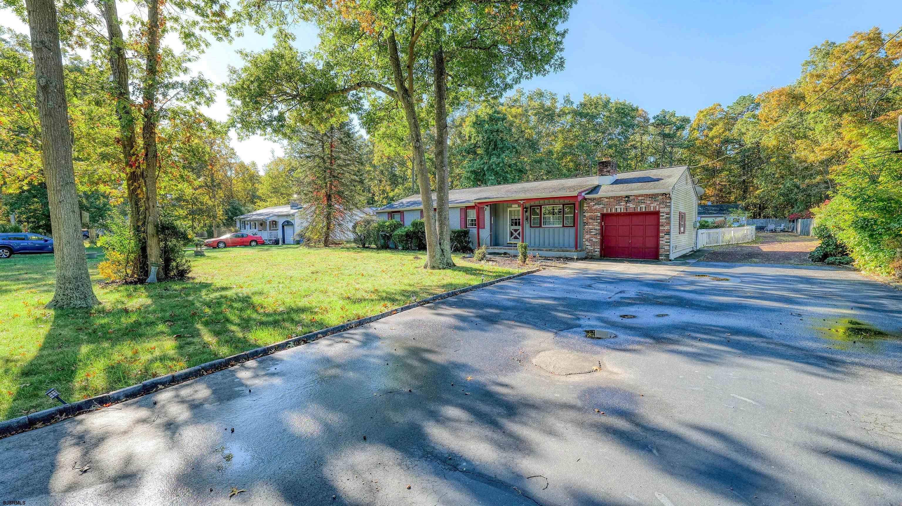 212 East Upland Avenue Galloway Township, NJ 08205 - Photo 2 of 37 a view of a house with a yard