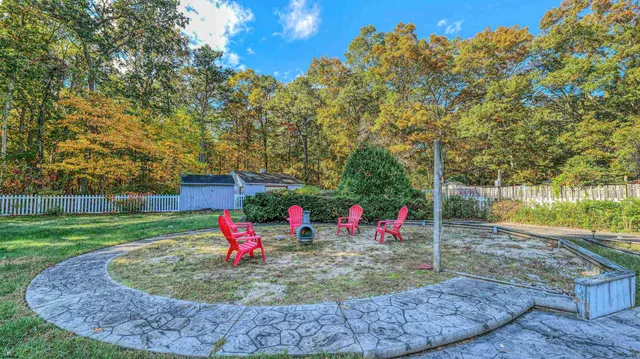 a view of a entertaining space in front of the house