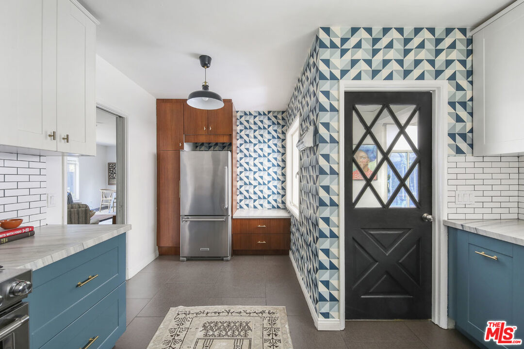 2145 Griffith Park Boulevard Los Angeles, CA 90039 - Photo 15 of 38 a hallway with a bench and cabinets
