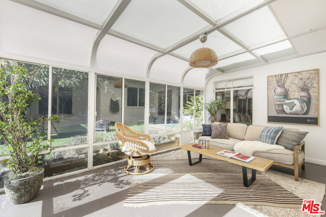 2145 Griffith Park Boulevard Los Angeles, CA 90039 - Photo 16 of 38 a living room with furniture and floor to ceiling window