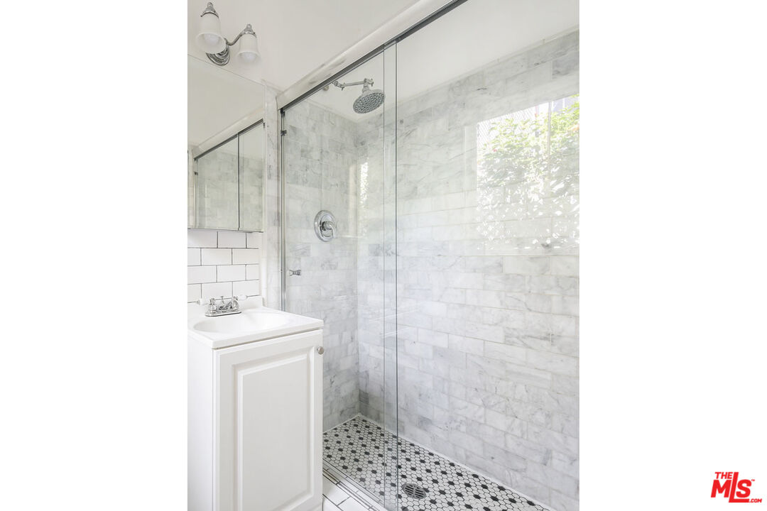 2145 Griffith Park Boulevard Los Angeles, CA 90039 - Photo 20 of 38 a bathroom with a sink a toilet and shower