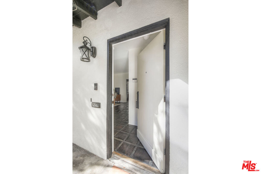 2145 Griffith Park Boulevard Los Angeles, CA 90039 - Photo 6 of 38 a bathroom with a shower and a mirror