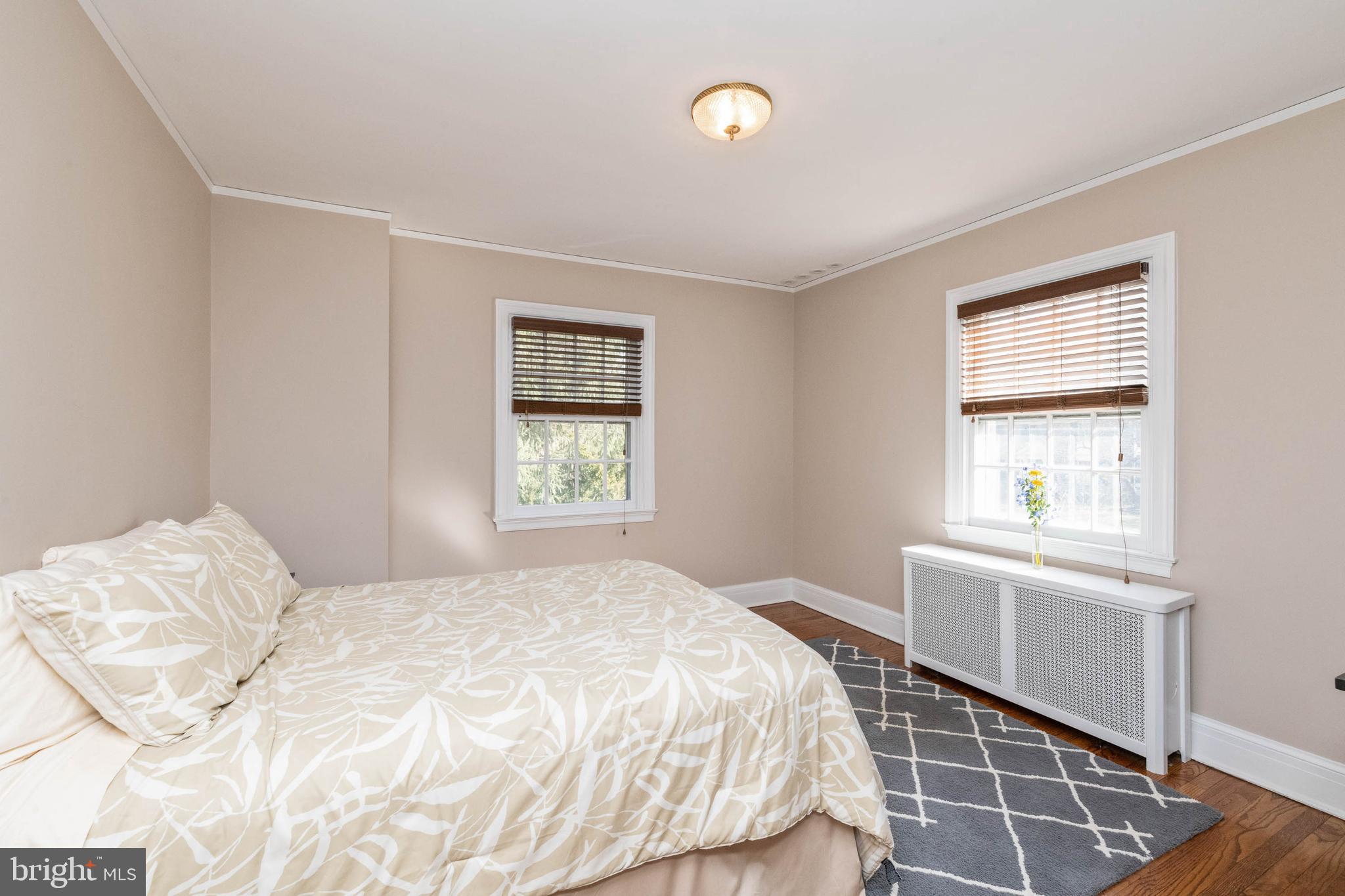 108 Overhill Road Baltimore, MD 21210 - Photo 14 of 29 a bedroom with a bed and a window