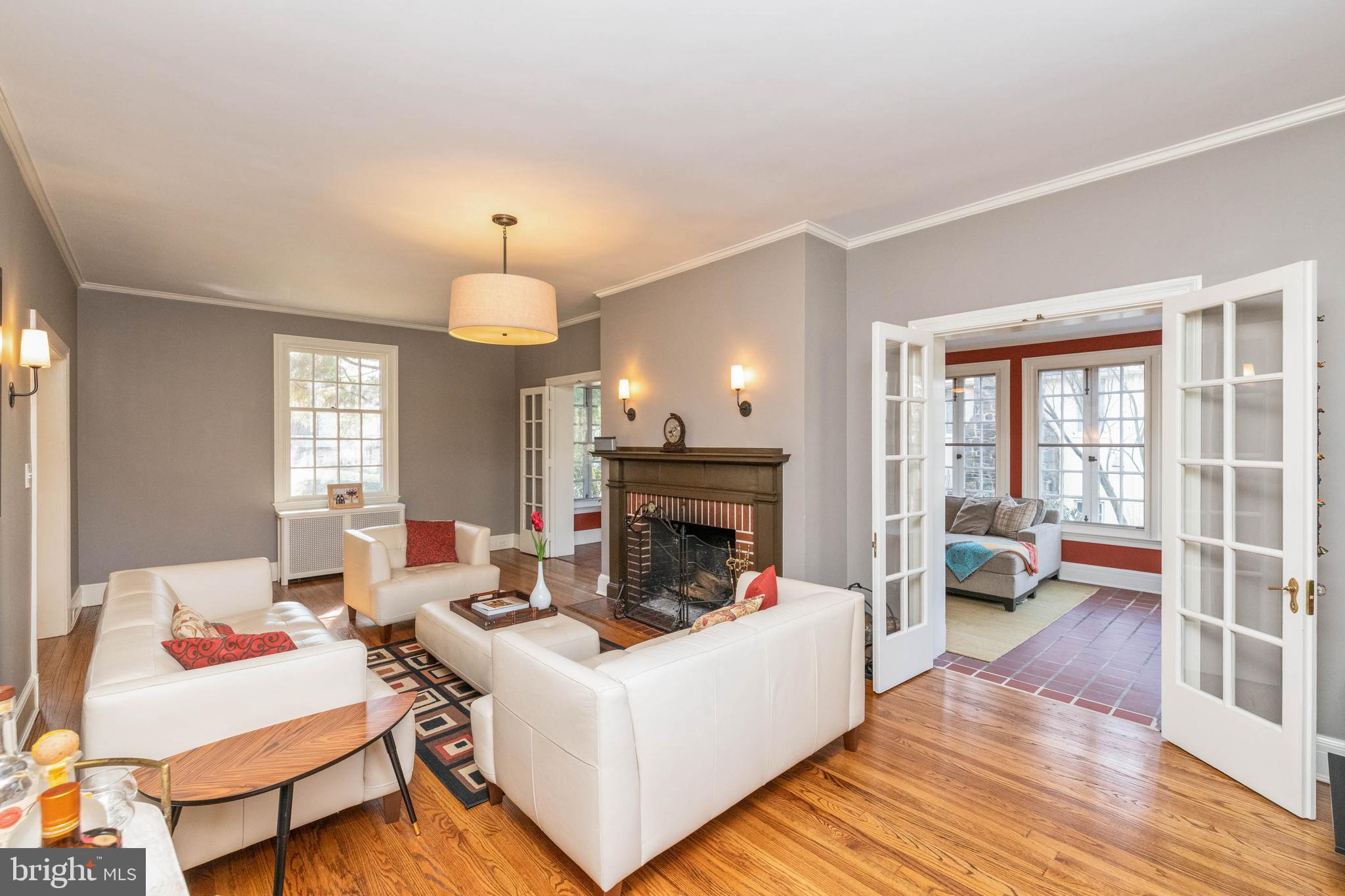 108 Overhill Road Baltimore, MD 21210 - Photo 3 of 29 a living room with furniture and a fireplace