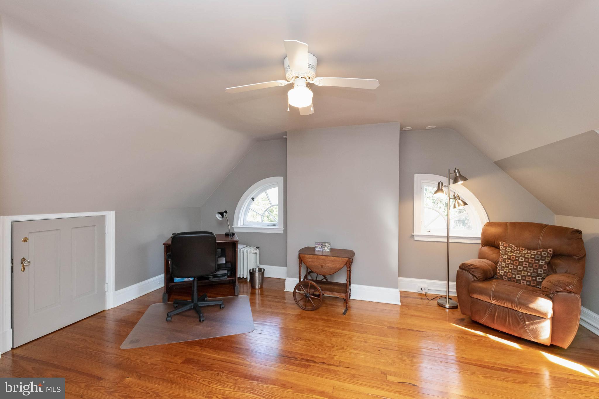 108 Overhill Road Baltimore, MD 21210 - Photo 22 of 29 a living room with furniture and a window