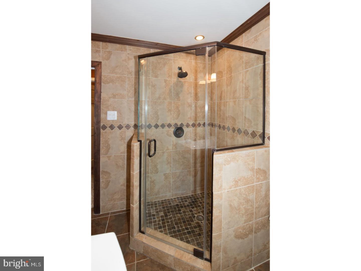 1755 Rockwell Road Abington, PA 19001 - Photo 11 of 19 a bathroom with a glass shower door