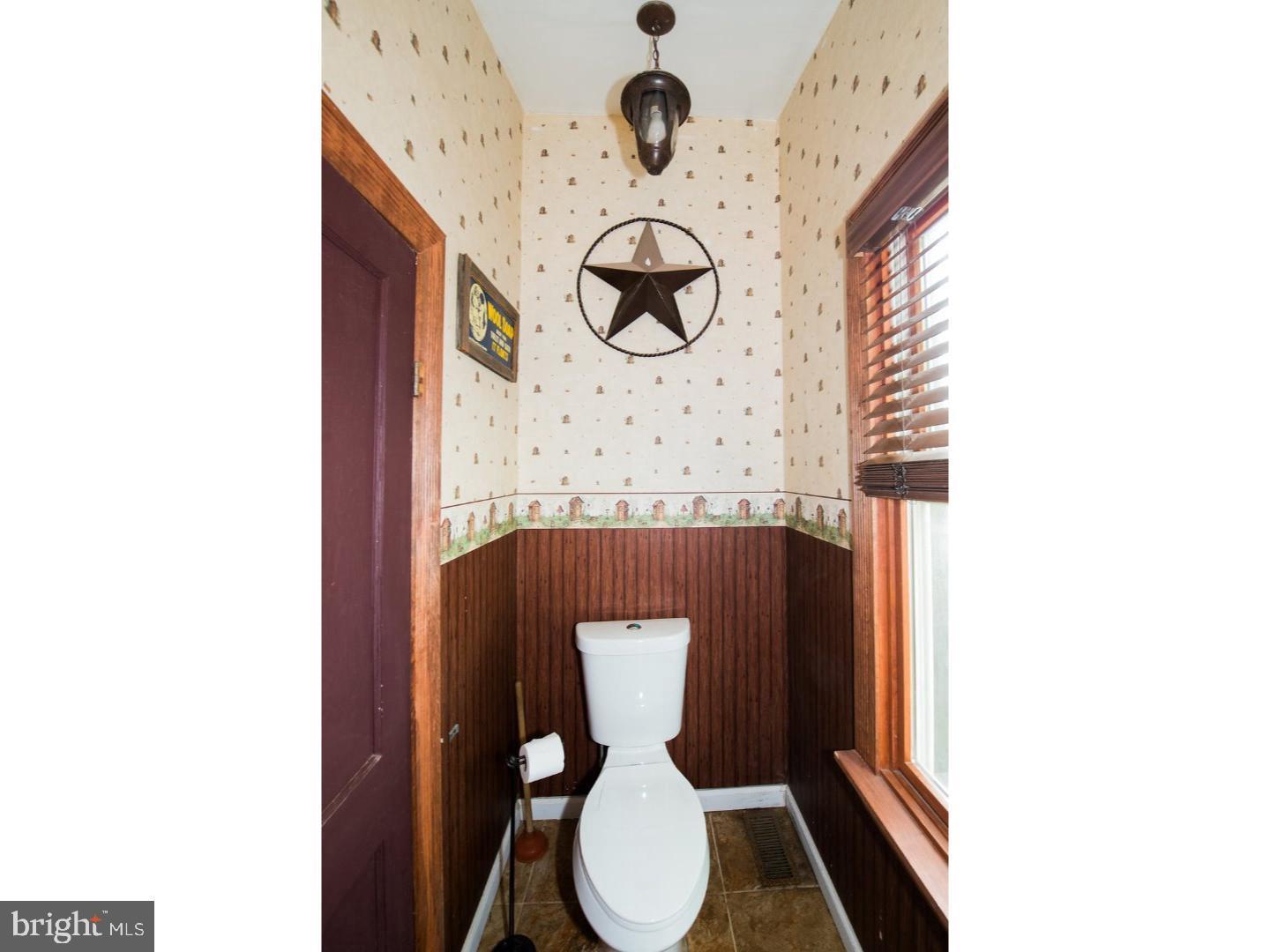 1755 Rockwell Road Abington, PA 19001 - Photo 14 of 19 a bathroom with a toilet and a sink