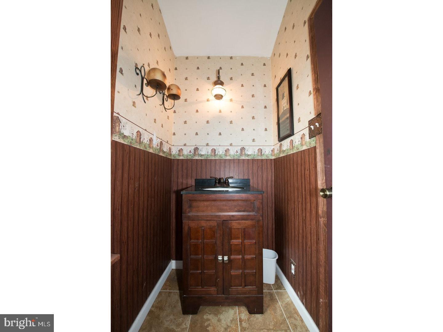 1755 Rockwell Road Abington, PA 19001 - Photo 15 of 19 a view of a hallway with two windows