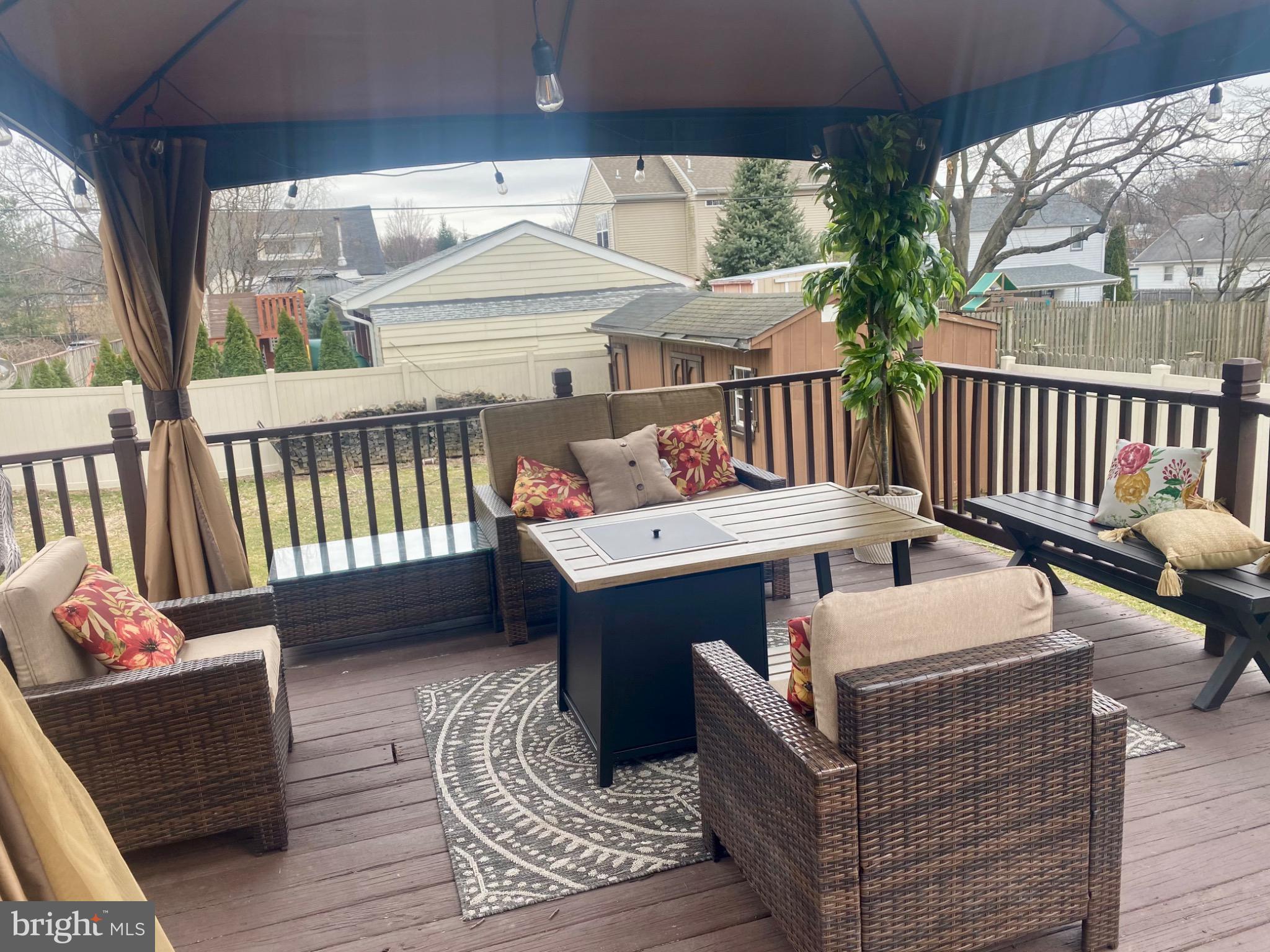 1755 Rockwell Road Abington, PA 19001 - Photo 16 of 19 a balcony with furniture and a potted plant